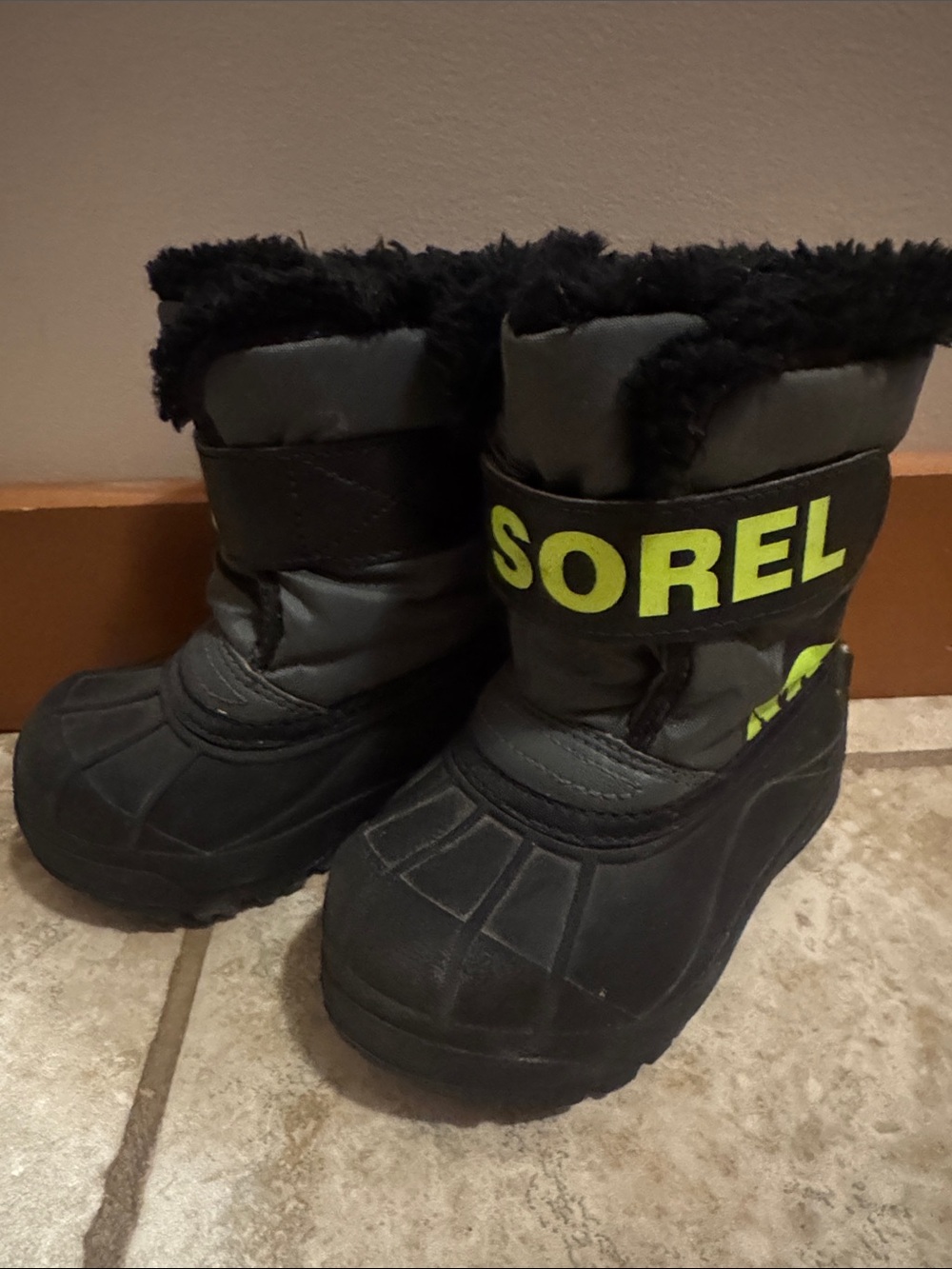 Sorel Kids Black Boots with Neon Yellow Logo